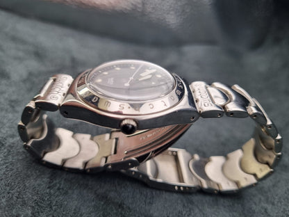 1999 Swatch Swiss Irony Date YGS414G Silver Tone Black Dial